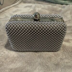 Silver clutch